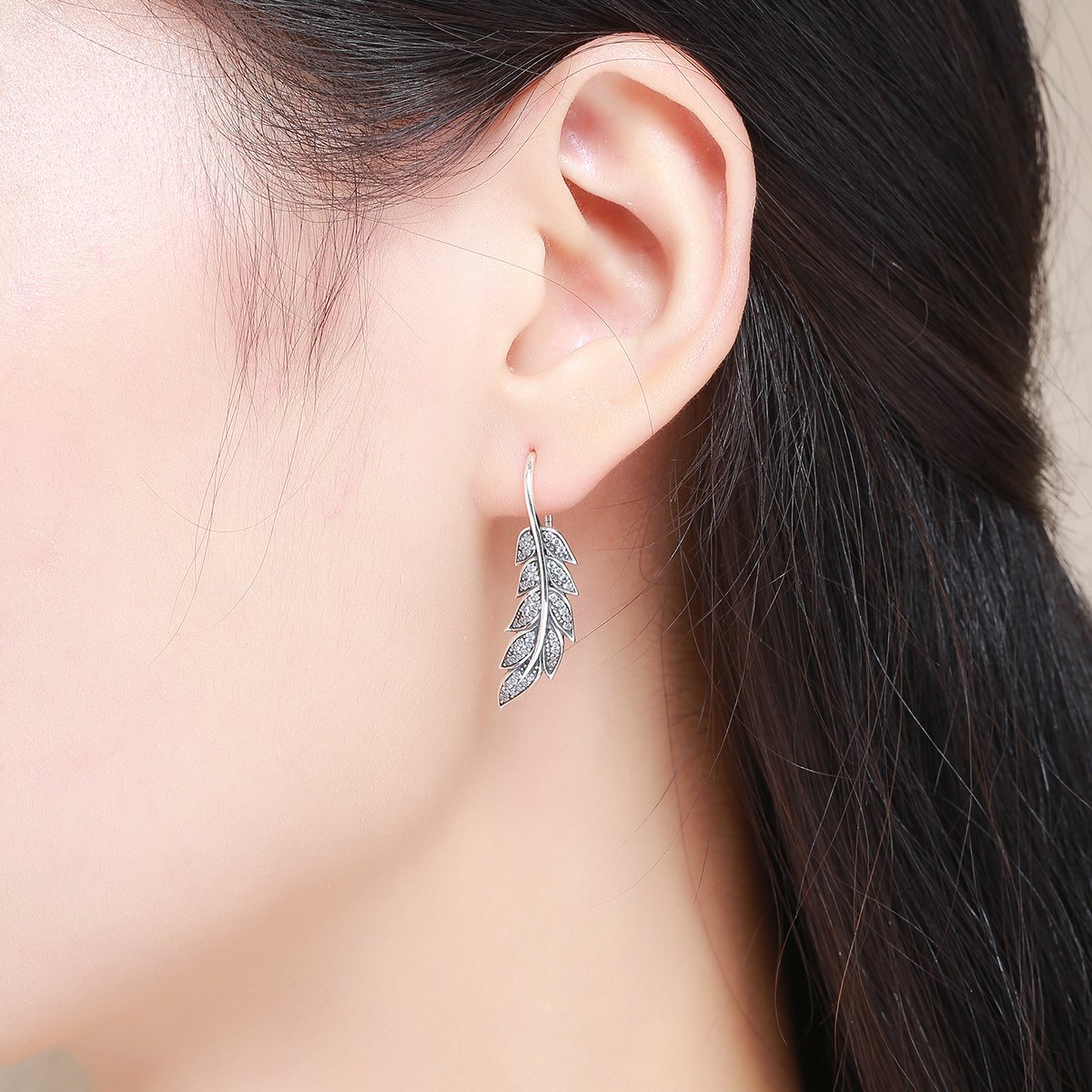 Aretes Brillo y Plumas - Plata .925