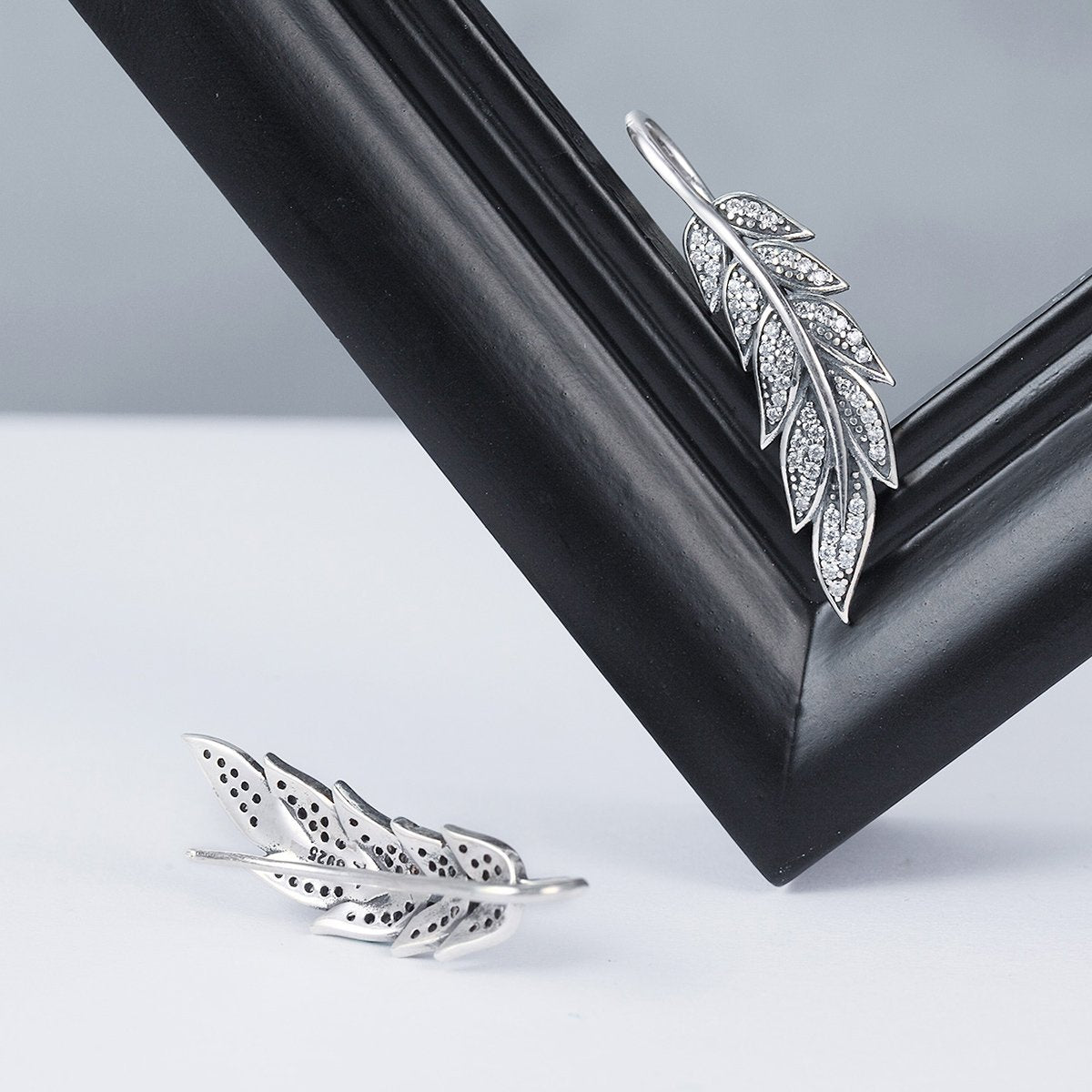 Aretes Brillo y Plumas - Plata .925